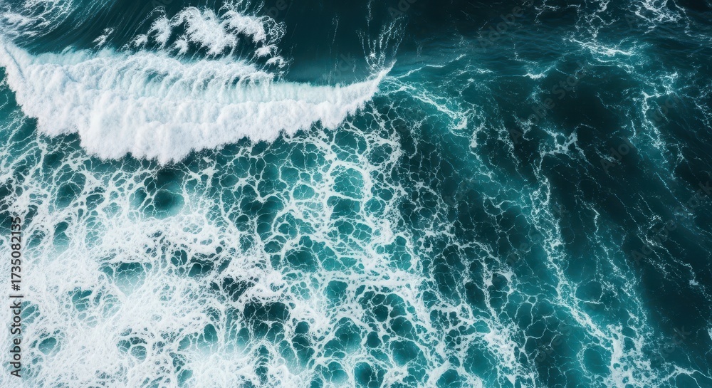 Fototapeta premium Aerial view of ocean waves crashing, capturing the dynamic textures and patterns of the sea's surface, showing beautiful patterns of the sea