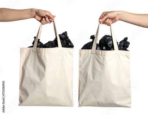 Two hands holding canvas totes filled with black bags