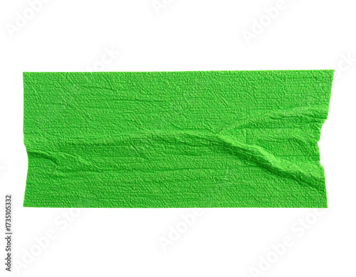 A vibrant green masking tape strip with crinkles and ragged edges on black