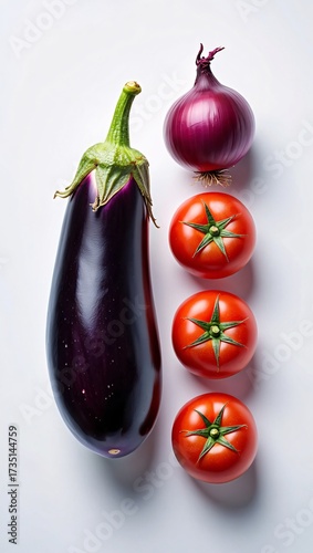 Fresh eggplant, tomatoes, and red onion isolated on white background