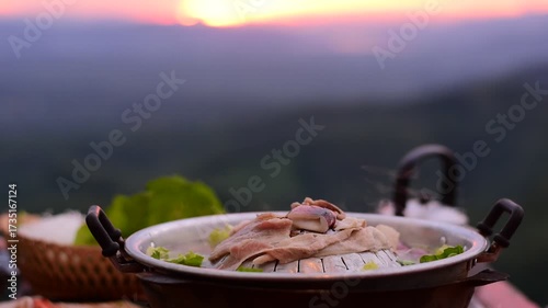 Pork BBQ with mountain view, Pork BBQ dinner with mountain view, cooking and eating Moo Kata, Thai barbecue grill pork with mountain view