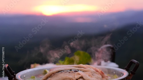 Pork BBQ with mountain view, Pork BBQ dinner with mountain view, cooking and eating Moo Kata, Thai barbecue grill pork with mountain view