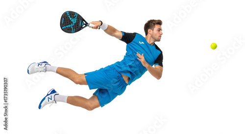 Athletic male padel player in blue sportswear dives mid-air to hit a ball, demonstrating agility, determination, and dynamic action in an intense sports moment against a clean white background.

