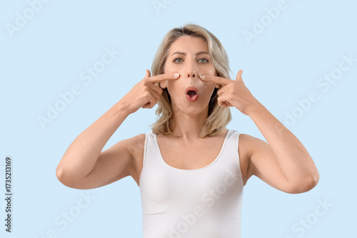 Beautiful woman doing face ...