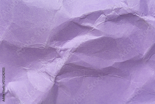 Crumpled sheet of violet pa...