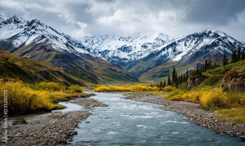 Snowy mountains, autumnal valley, rushing river