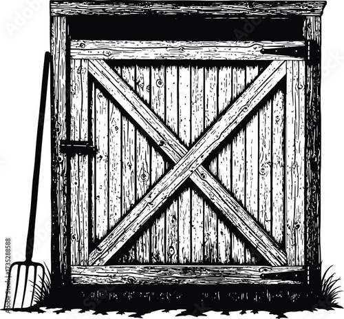 Rustic wooden shed with crossed planks and pitchfork, farm storage