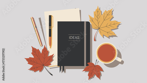 Autumnal inspiration with a dark notebook labeled ideas pens and a warm cup of tea surrounded by fallen leaves