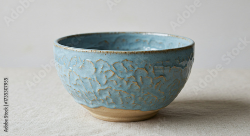 Wallpaper Mural Artisan Light Blue Ceramic Bowl with Unique Textured Glaze and Wabi-Sabi Style Torontodigital.ca