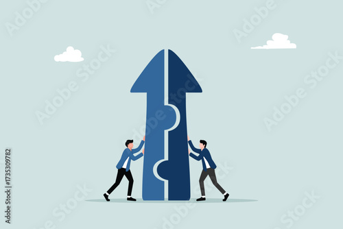 Mergers and Acquisitions, partnerships or teaming up, success puzzles, growth solutions or collaborations, two businesspeople pressing the jigsaw arrows to join forces for success.