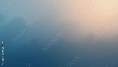 Abstract mountain silhouette in blue fog mist with orange light gradient sky background