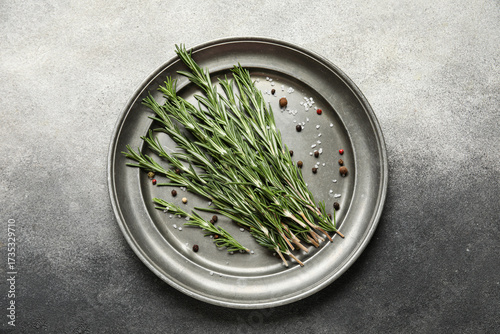 Fresh rosemary sprigs and p...