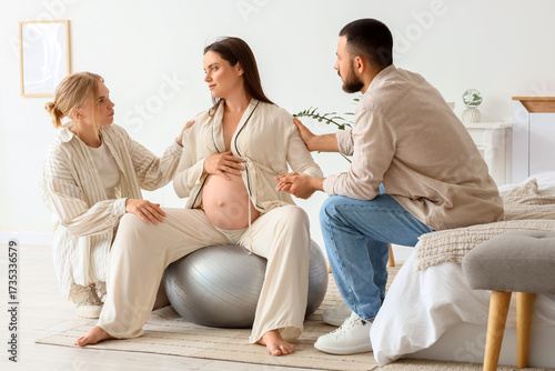 Young happy pregnant woman ...