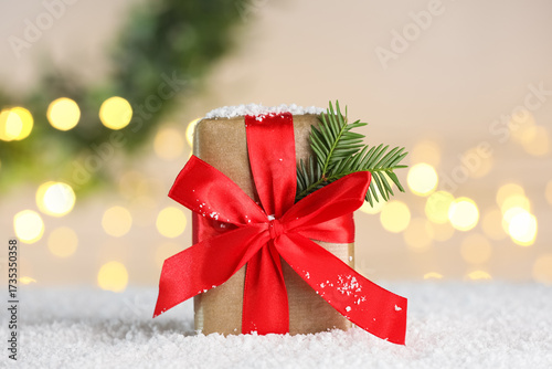 Gift box with fir tree bran...