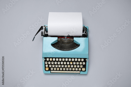 Vintage blue typewriter wit...
