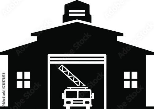 Silhouette of a fire station with a fire truck inside