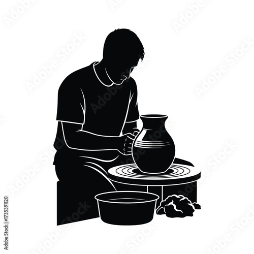 silhouette of a potter working on a pottery wheel