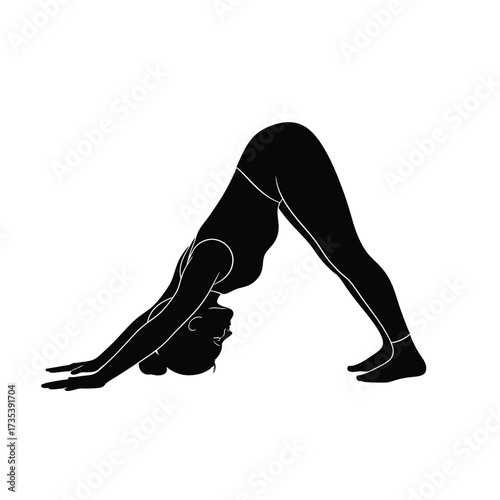 silhouette of a woman doing yoga downwardfacing dog pose