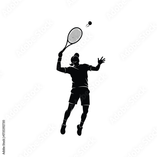 silhouette of a tennis player serving a ball