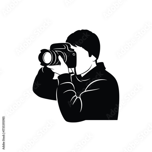 silhouette of a person taking a photo with a camera