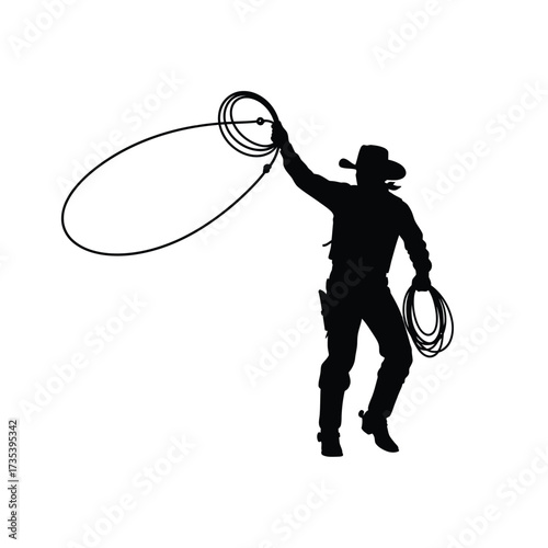 silhouette of a cowboy throwing a lasso