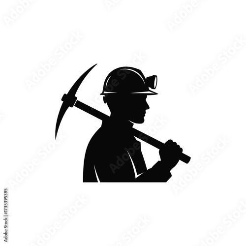 silhouette of a miner with a pickaxe