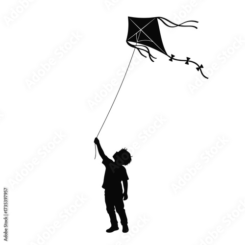 silhouette of a child flying a kite