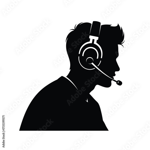 silhouette of a man wearing headphones with a microphone