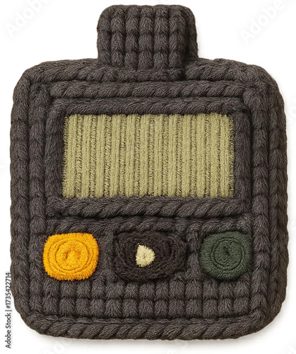 Hand-knitted textile replica of an old-fashioned pager, a vintage communication device, with a woven screen and buttons