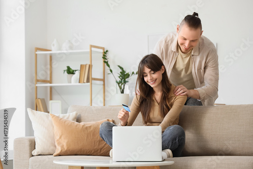 Happy young couple shopping...