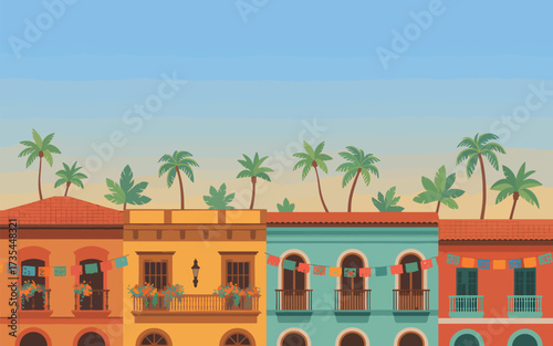 Colorful buildings with balconies and palm trees under blue sky