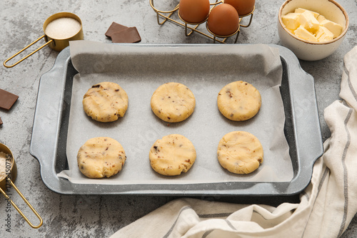Baking tray with raw cookie...
