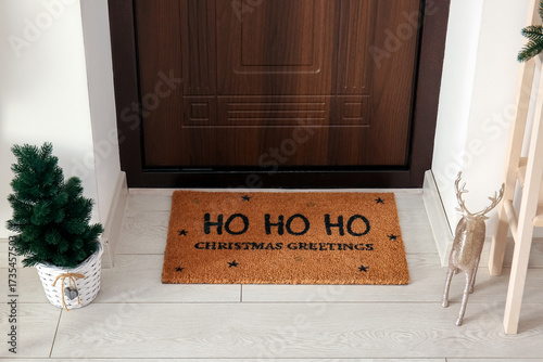Doormat with Christmas gree...