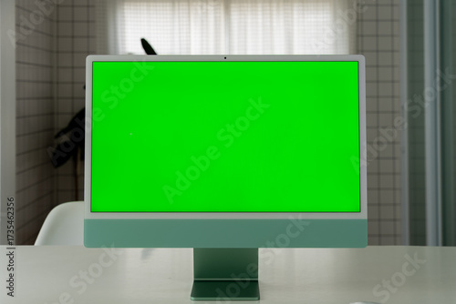 Laptop Computer with Green Screen on a Home Work Desk, High-Quality 4K HD Footage