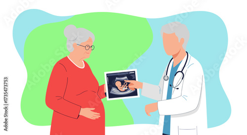 Older pregnant woman consults with doctor about ultrasound results.