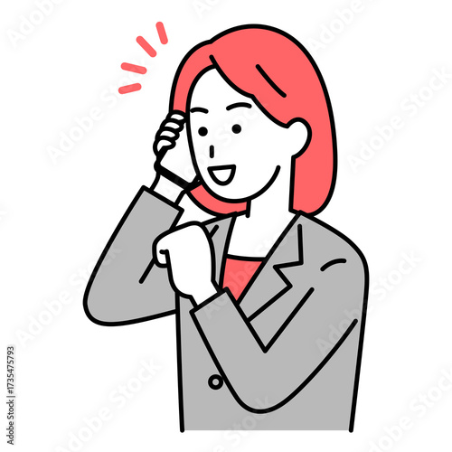 スマートフォンでの通話で喜ぶスーツの女性
