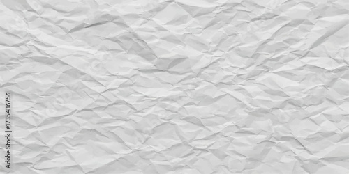 An old, crumpled and creased blank sheet of rough vintage paper with a wrinkled texture and damaged torn surface pattern