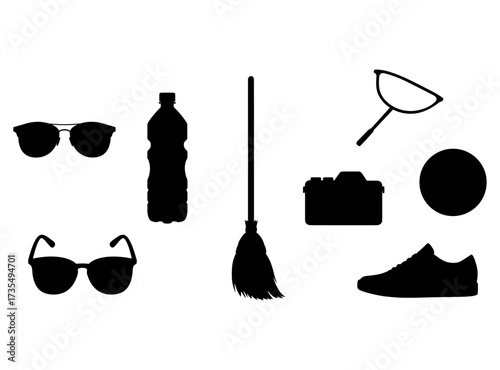 Collection of essential daily items represented as sleek black silhouettes on a clean white background, perfect for modern design concepts