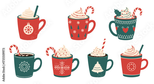 Festive cups of hot chocolate with whipped cream and candy canes.