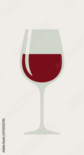 A glass of red wine on a plain background.