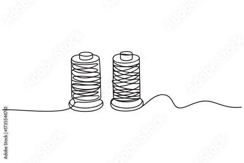 Spools of thread in one continuous line drawing vector illustration. one line Icon drawing with white background