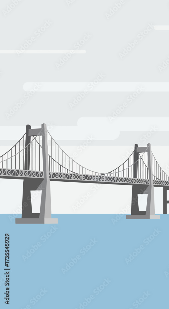 Fototapeta premium Suspension bridge spans across calm blue water under a cloudy sky.