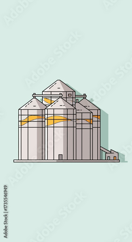 Industrial silos for grain storage against a light background.