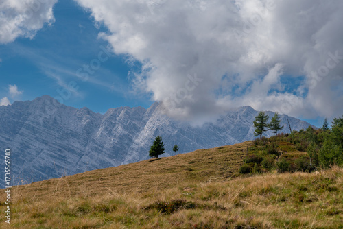 View into the Steinernes Meer limestone plateau with rugged alpine peaks and dramatic clouds