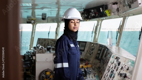 Navigating the Seas of Leadership: A confident female mariner stands at the helm of a ship, surrounded by intricate navigational instruments and the endless expanse of the ocean.