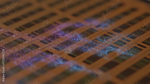 Microscopic Electronic Components on Semiconductor Wafer Under Inspection.