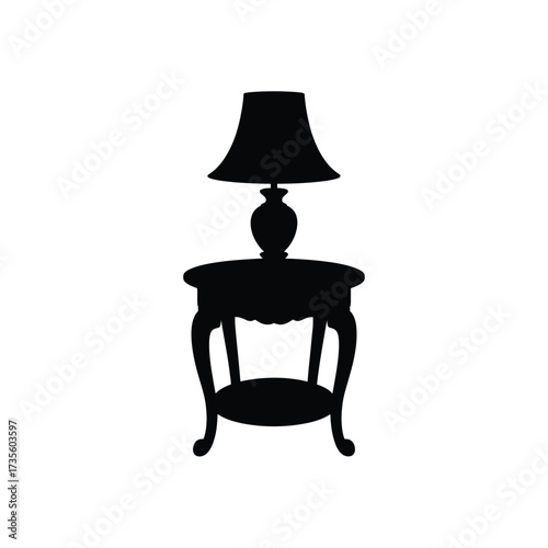 Elegant table lamp on ornate side table silhouette