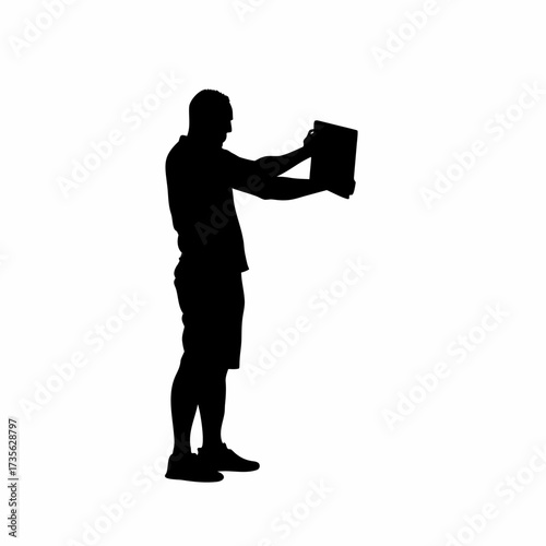 Silhouette of an adult man practicing writing with chalk on a slate isolated on white background