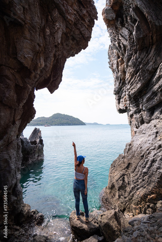Beautiful Thai woman takes photos with beautiful tourist attractions, secret photo spots on Koh Sichang, Chonburi Province, Thailand.