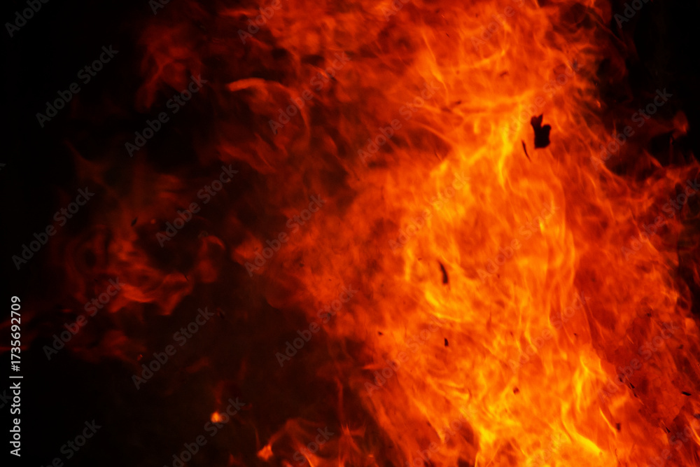 Fototapeta premium Close up burning flames on black background for graphic design or wallpaper.
